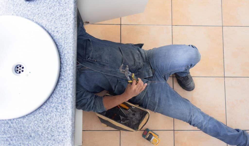 top view plumbing man floor maintenance service engineering renovation house handyman plumber contractor with mechanic tools home upgrade builder project pipes 590464 155709