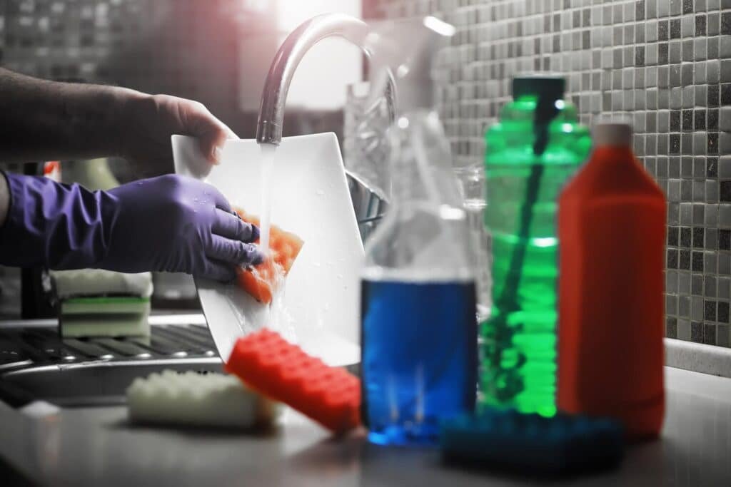 white bottle with dishwashing gel background sink with dirty dishes pouring water from tap 494741 184204 white bottle with dishwashing gel background sink with dirty dishes pouring water from tap 494741 184204